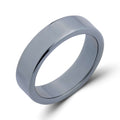 Flat-profile hematite ring with a polished mirror surface on a white background