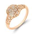 Warm gold-tone ring with a round cubic zirconia top and lace openwork band