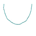 Necklace of tiny faceted greenish-blue beads with an adjustable steel clasp