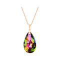 Necklace with a multicoloured teardrop crystal glinting green, pink and gold