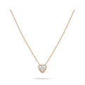 Fine chain necklace with a double heart pendant and a sparkling crystal