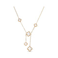 Necklace with five white four-leaf clovers in gold-tone beaded frames