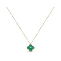 Green enamel four-leaf clover in a golden beaded frame on a fine chain