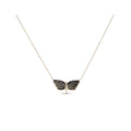 Butterfly pendant with wings covered in black crystals on a gold-plated chain