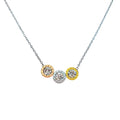 Three Roman numeral circles in silver, gold and rose tones, each with cubic zirconia