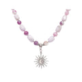 Lilac natural stone bead necklace with a silver-tone sun and moon pendant