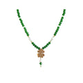Gold-tone four-leaf clover with a pearl on a green crystal necklace