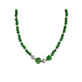 Green bead necklace with two heart-shaped stones and white pearls