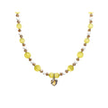 Necklace of yellow beads and white nephrite with a heart pendant