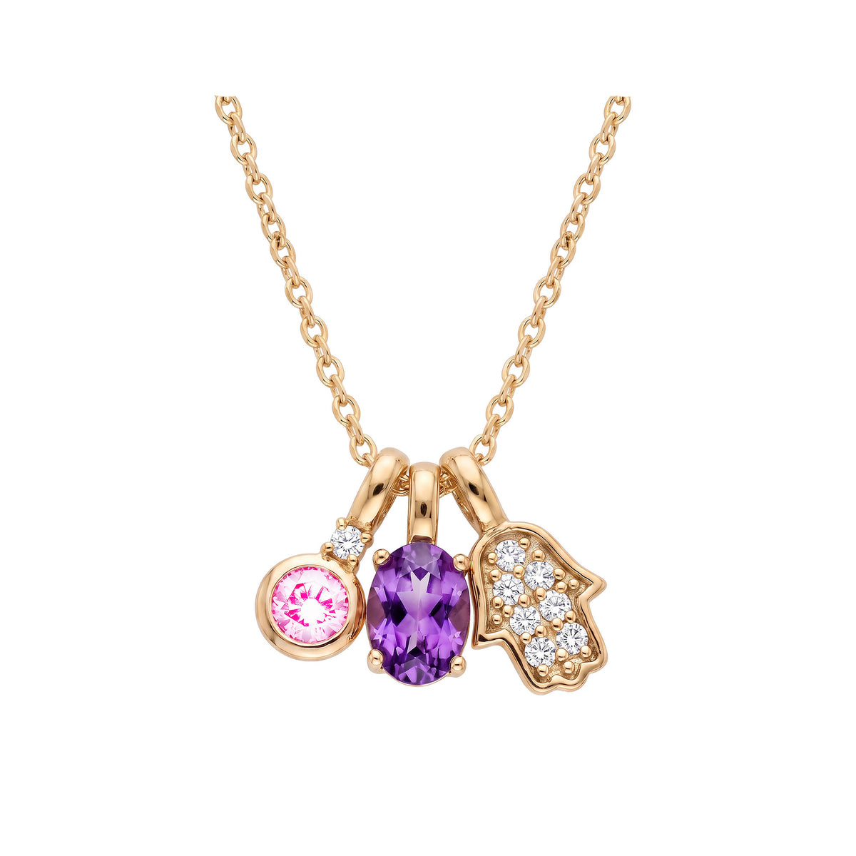 Three pendants on a gold-tone anchor chain on a white background