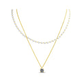 Double-strand gold-plated necklace with white pearls and a round crystal pendant