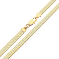 Wide flat gold-plated chain with a glossy surface and lobster clasp on white