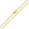 Smooth gold-plated snake chain close up with a lobster clasp on white