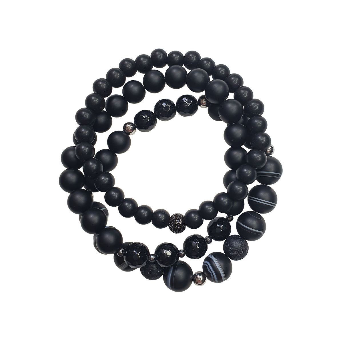 Three black bracelets of matte, faceted and striped beads with silver-tone spacers