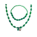 Green glass teardrop bead necklace and bracelet with clover and horseshoe charms