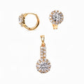 Gold-plated set of cubic zirconia hinged hoop earrings and matching pendant on white