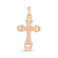 Gold-plated Catholic cross pendant with the figure of Christ and ornate rounded ends