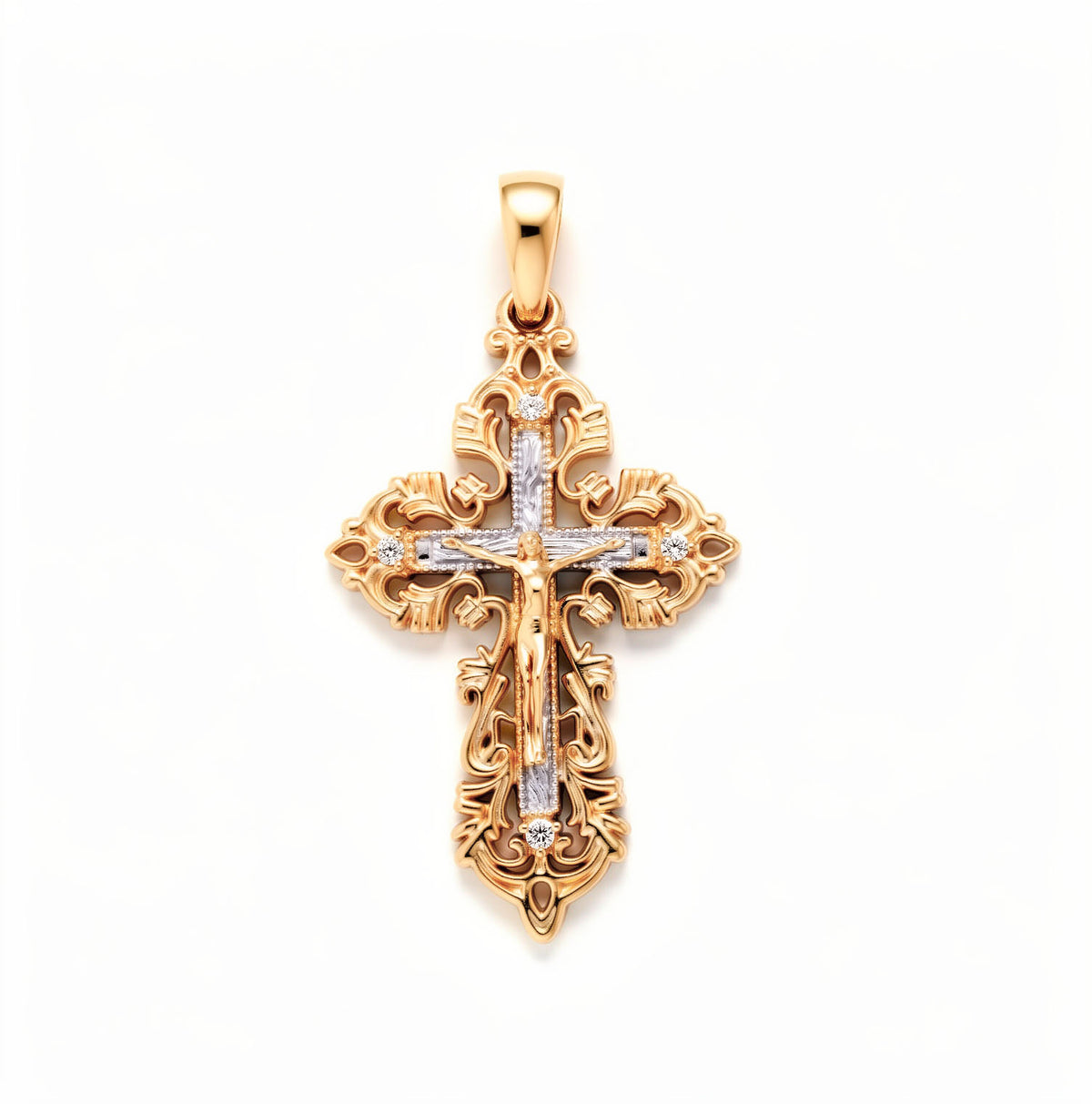 Two-tone cross pendant with a silver-tone crucifix, clear stones and ornate border