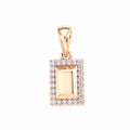 Rectangular pendant with a golden centre stone and a white cubic zirconia frame