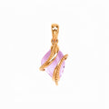 Pendant with a soft pink stone wrapped in beaded gold-plated spiral lines
