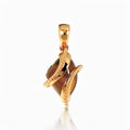 Pendant with a domed coffee-coloured stone in a double beaded gold-tone frame