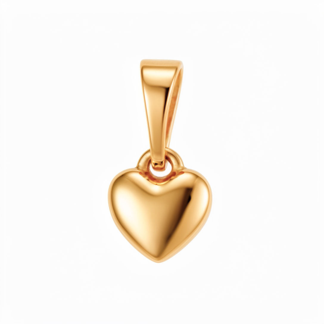 Small heart pendant with a mirror-smooth gold-tone surface and no stones