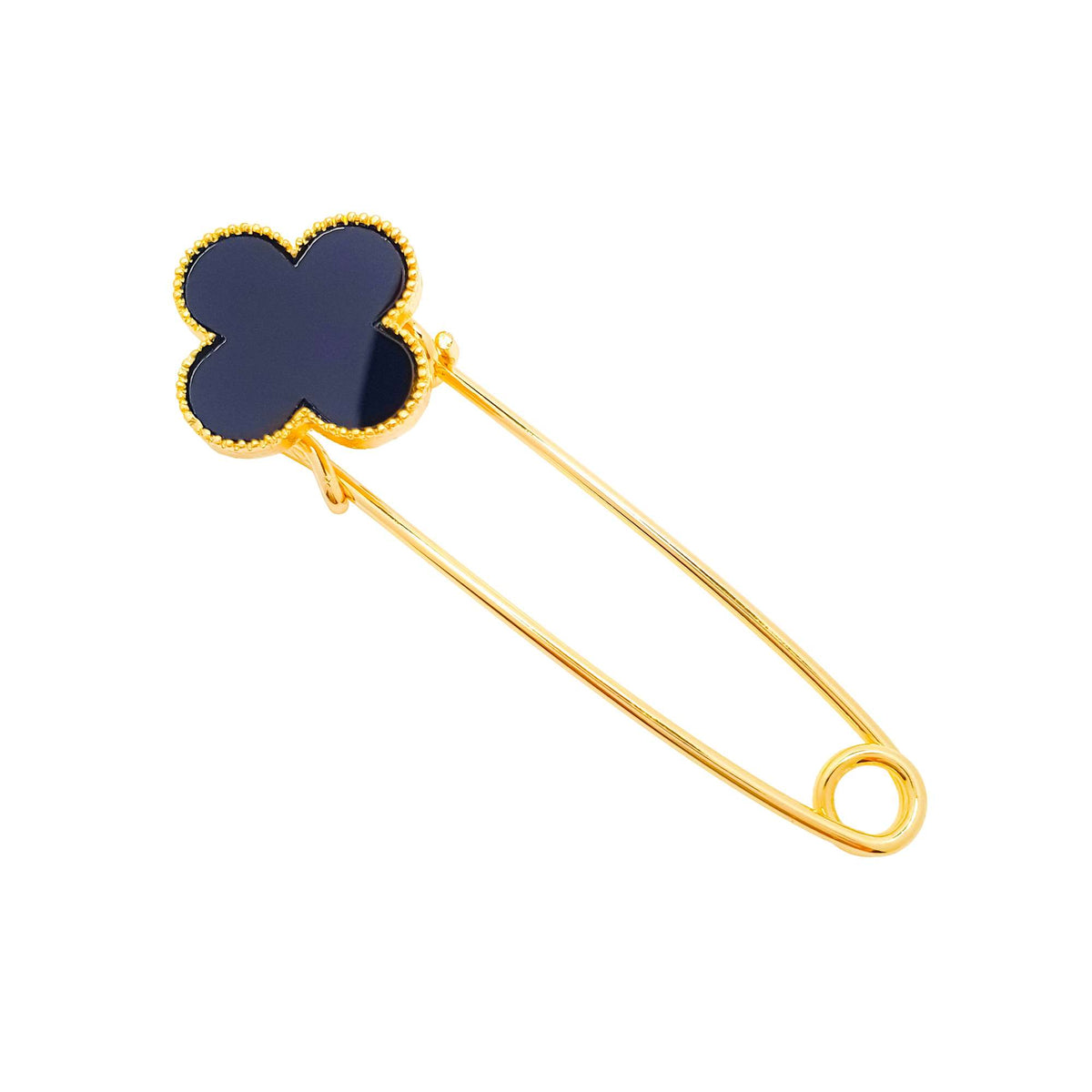Black clover brooch with a golden beaded frame on a long safety pin
