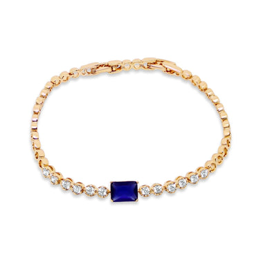Tennis bracelet with a dark blue stone