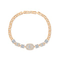 Gold-plated link bracelet with square cubic zirconia and a sparkling centre, white background
