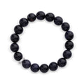 Bracelet of dark blue goldstone beads with a sparkling cubic zirconia spacer