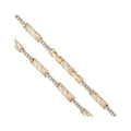 Close-up of Greek key links with rows of cubic zirconia and clasp
