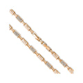 Close-up of gold-plated Greek meander links, cubic zirconia bars and clasp