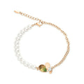 Pearl bead bracelet with a heart, greenish teardrop stone and gold-tone chain