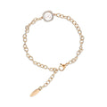 Gold-tone anchor chain bracelet with a white faux pearl in a cubic zirconia halo