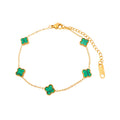Gold-plated bracelet with green clovers, a lobster clasp and an adjustable extension chain