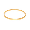 Gold | Smooth hinged bangle seen from the front