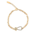Gold-plated oval link bracelet with a teardrop clasp set with cubic zirconia on white