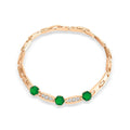Rose gold-tone bracelet with three green hexagonal crystals and cubic zirconia
