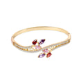 Rigid gold-plated bangle with coloured leaf-shaped cubic zirconia and rows of white stones