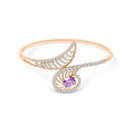 Rose gold-tone bracelet with an oval violet stone and crystal leaf pattern, white background