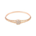 Lattice bangle with a round rose medallion covered in cubic zirconia