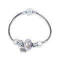 Snake chain bracelet with a crown charm, pearly bead and cubic zirconia balls