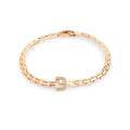 Gold-plated rectangular link bracelet with cubic zirconia buckle on white background