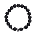 Black agate bead bracelet with a silver-tone skull, top view