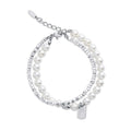Two-strand bracelet with white faux pearls, silver-tone beads and a small tag charm