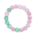 Bracelet with soft pink quartz beads and turquoise cat's eye glass beads